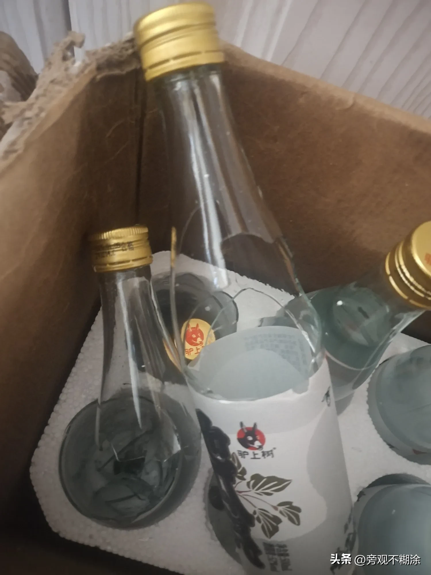 51助手：快递酒瓶破损事件，如何维权与退款攻略